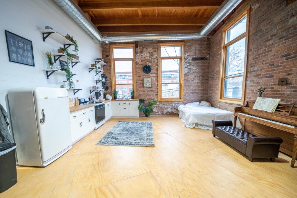 Chi 3 - cozy kitchen, brick corner, wood floor, mezzanine, large daylight photo studio