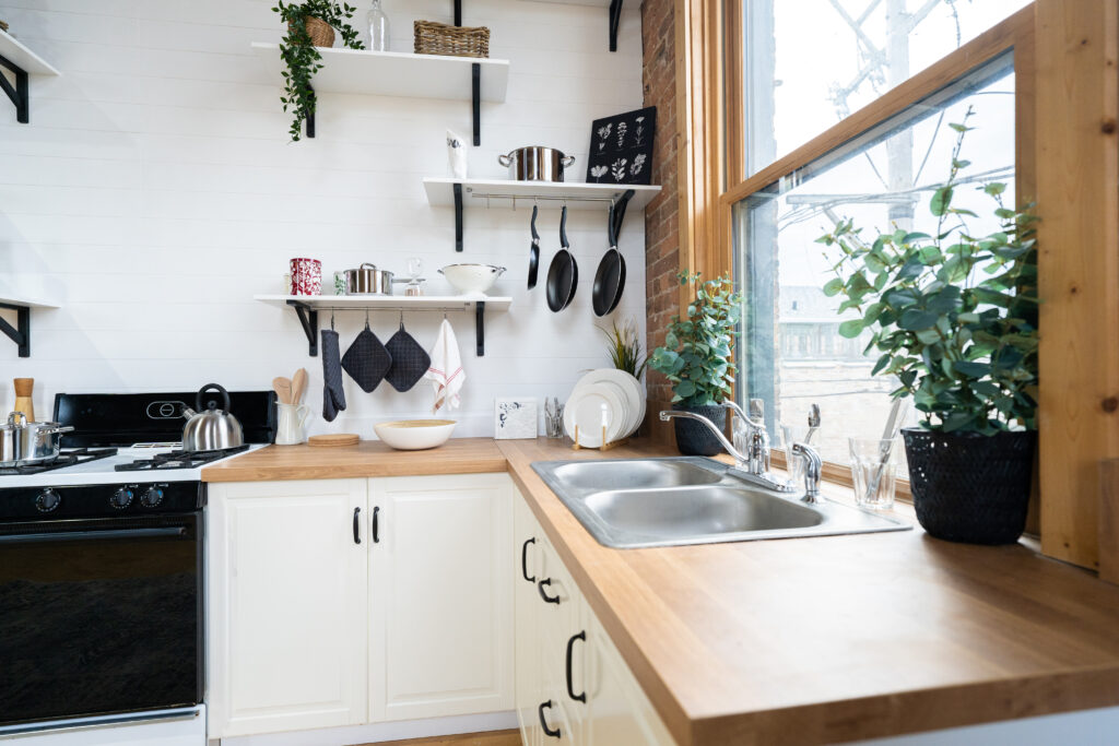 Chi 3 - cozy kitchen, brick corner, wood floor, mezzanine, large daylight photo studio
