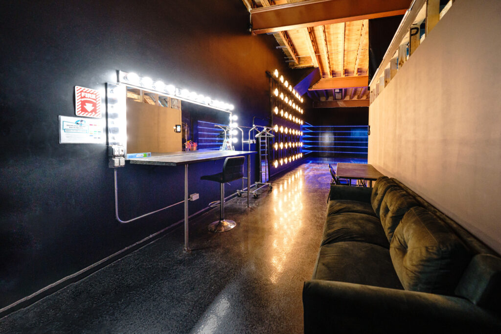 Large blackout studio with high ceilings, a Sport Bike, controllable sound synchronized RGB Lights, and RGB Tunnel for car photo and video shoots Chicago 1
