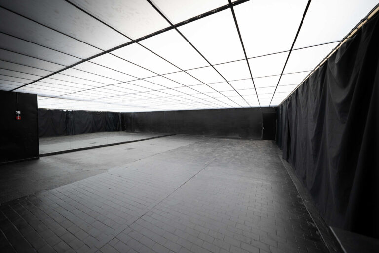 Photo & video studio for cars with drive-in access, Mirror walls on both sides, and fully controllable RGB Ceiling photo studio in New York