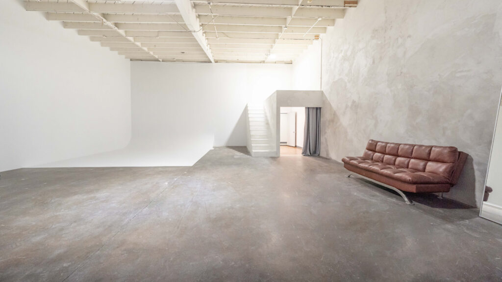 Cyc wall photo studio for rent with white steps yukon 2