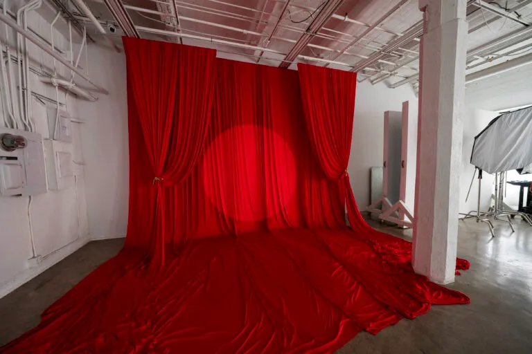 Daylight Photo Studio in Los Angeles with red backdrop