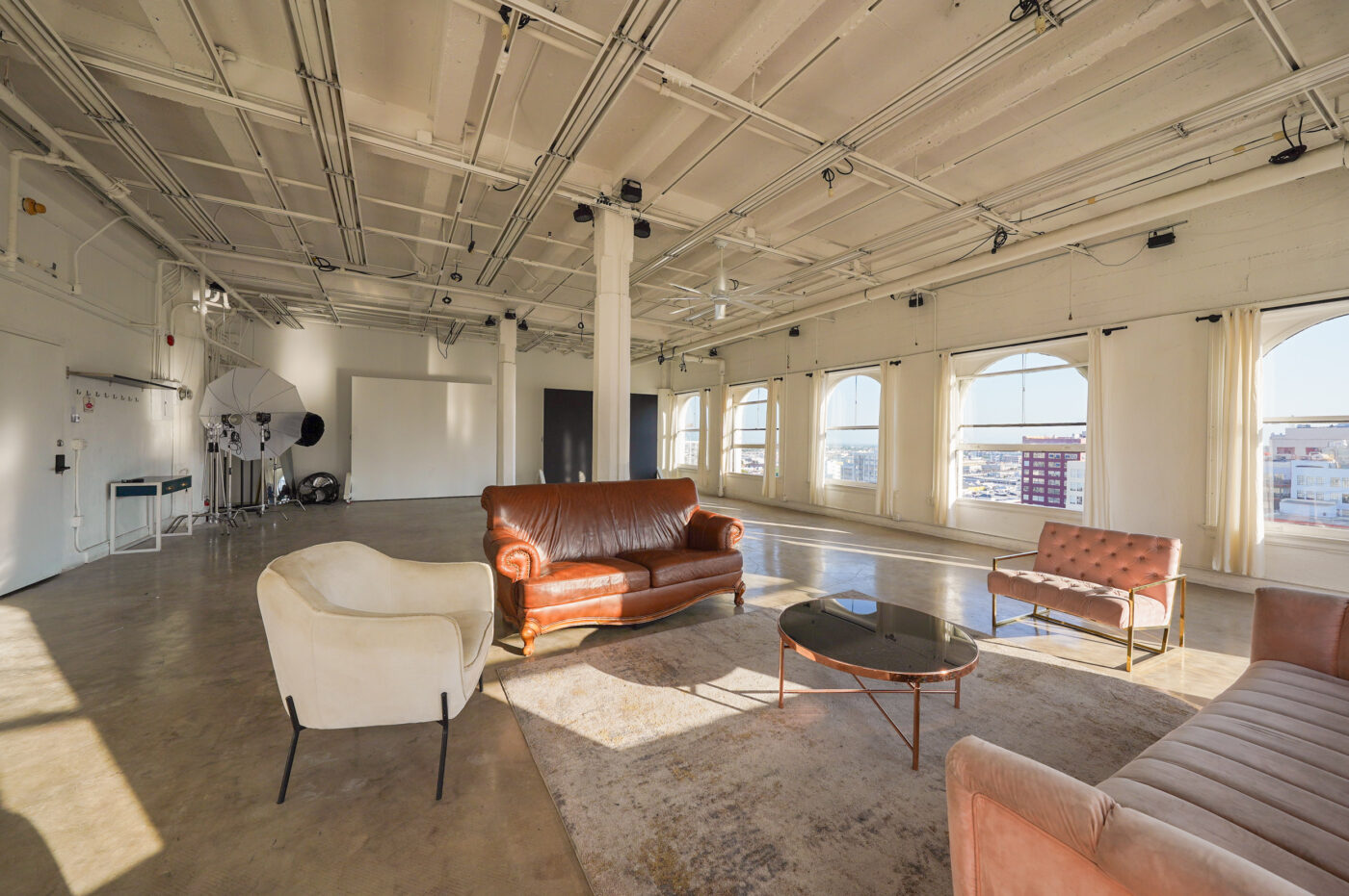 Daylight Photo studio for rent in Los angeles with arched windows and dt views