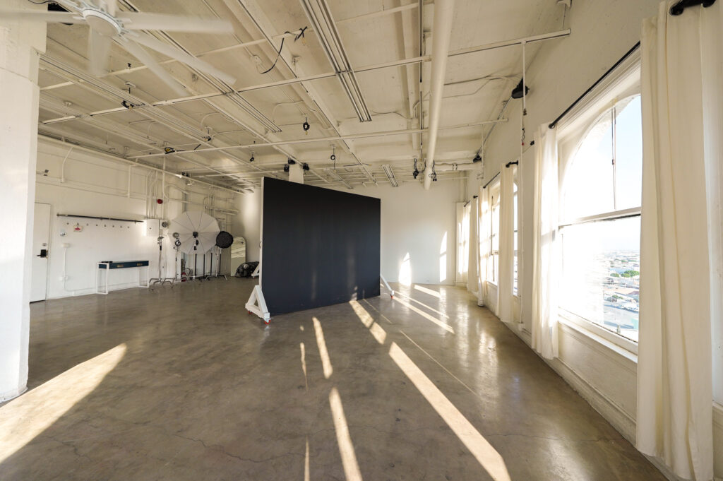 Daylight Photo studio for rent in Los angeles with arched windows and dt views