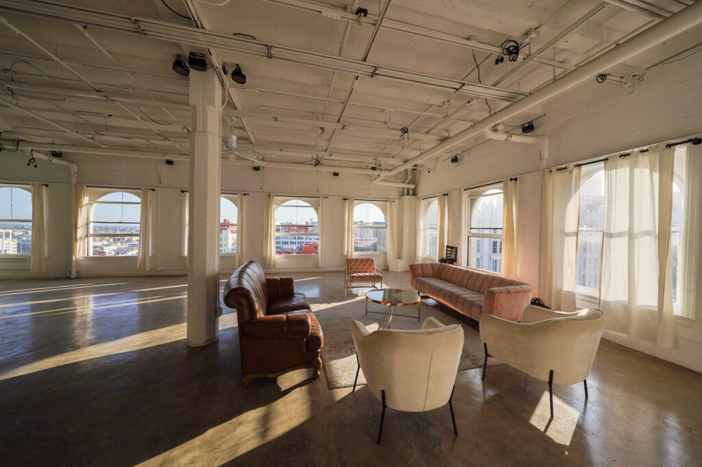 Daylight Photo studio for rent in Los angeles with arched windows and dt views