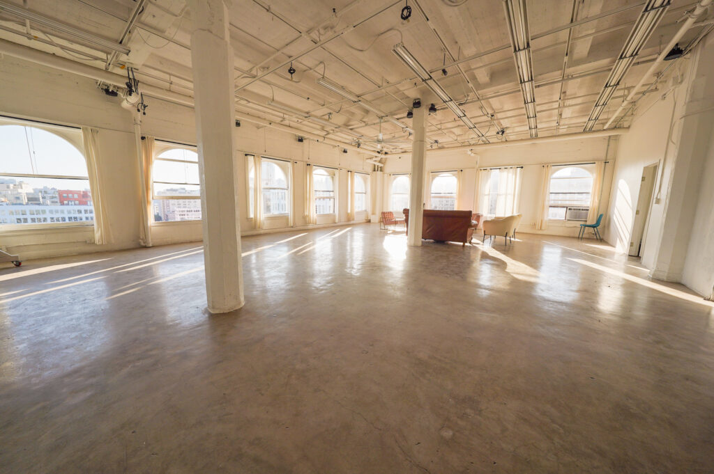 Daylight Photo studio for rent in Los angeles with arched windows and dt views