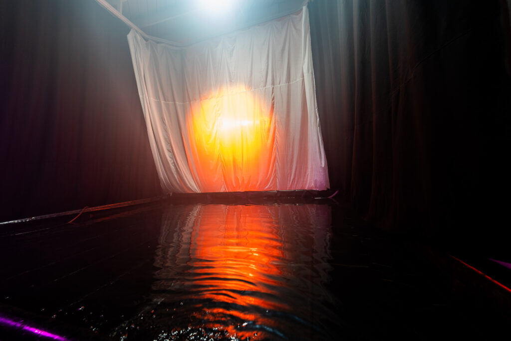 photo studio with a pool filled with water large curtains white walls in Los Angeles Yukon 3-6