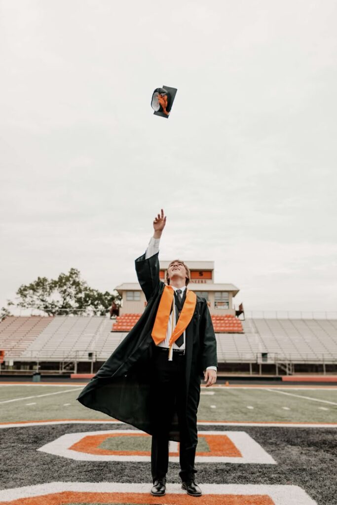 graduation photo hat pose