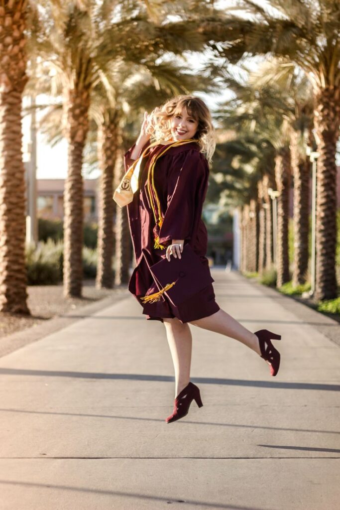 graduation photo jump pose